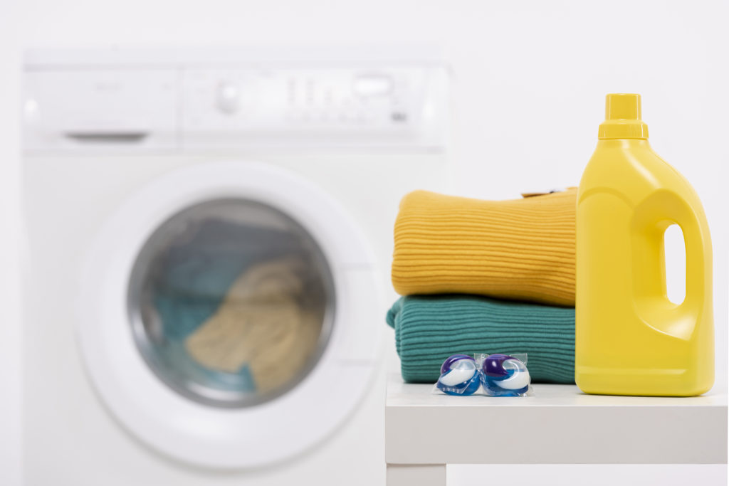 yellow-detergent-bottle-with-washing-tablets-scaled